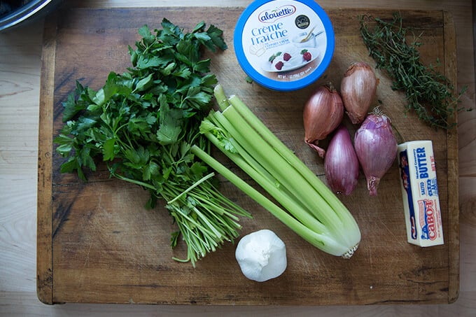 Ingredients on a board for mussels.