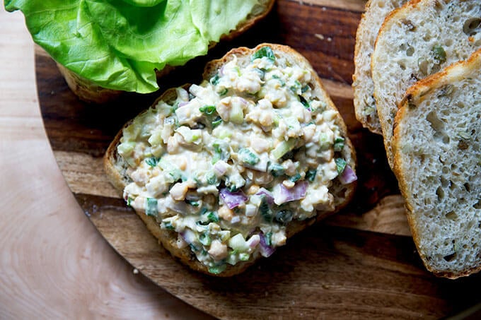 No-tuna tuna salad on a halved slice of three seed bread.