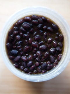 An overhead shot of a quart of cooked slow cooker black beans.