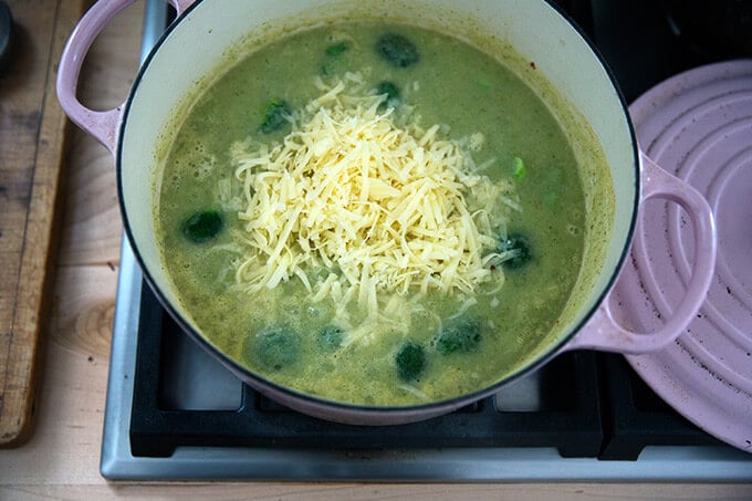 A Dutch oven with broccoli cheddar soup in the works.