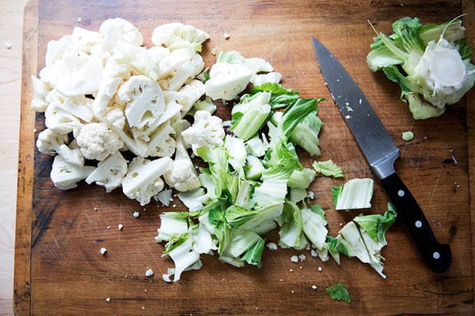 A head of cauliflower cut into florets.