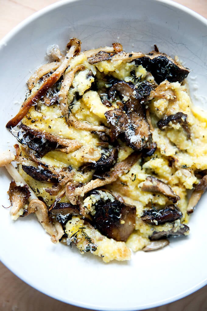 An up close shot of a bowl of roasted mushroom polenta bake.