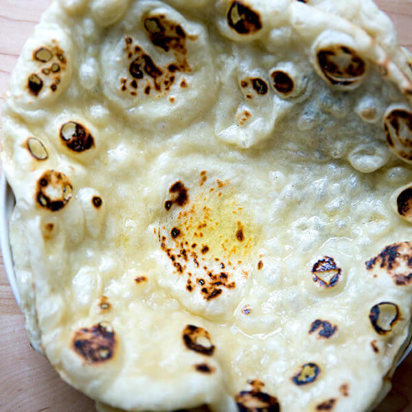 Just baked naan in a bowl.