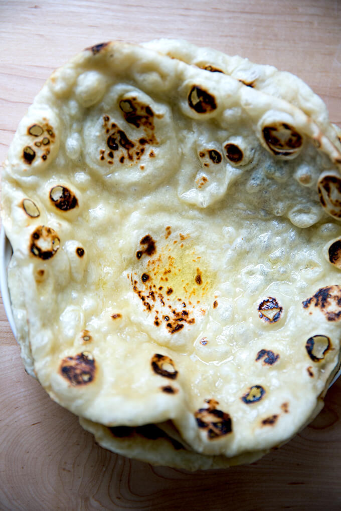 Just baked naan in a bowl.