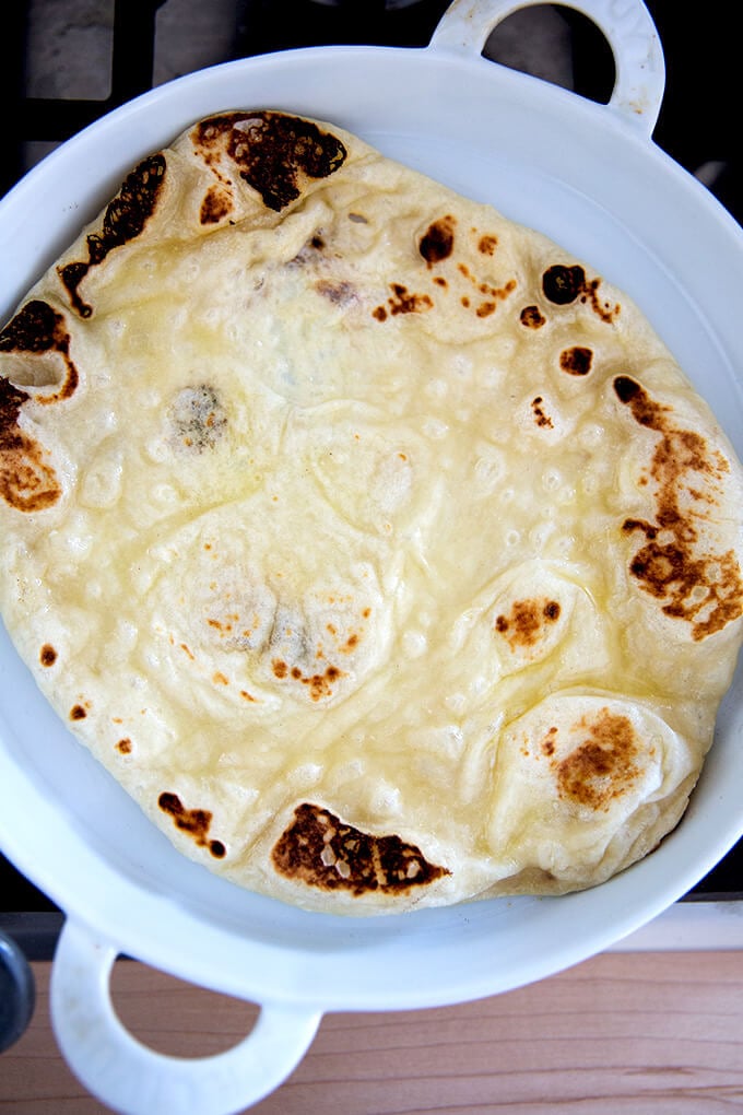 A freshly griddled round of naan.