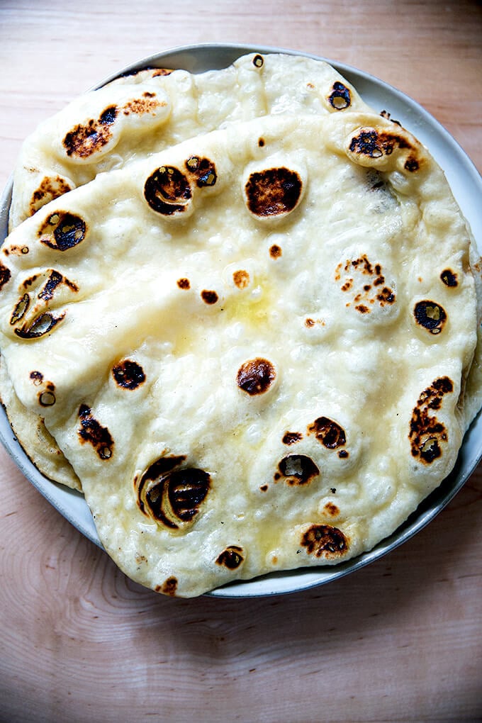 Fresh naan on a plate.