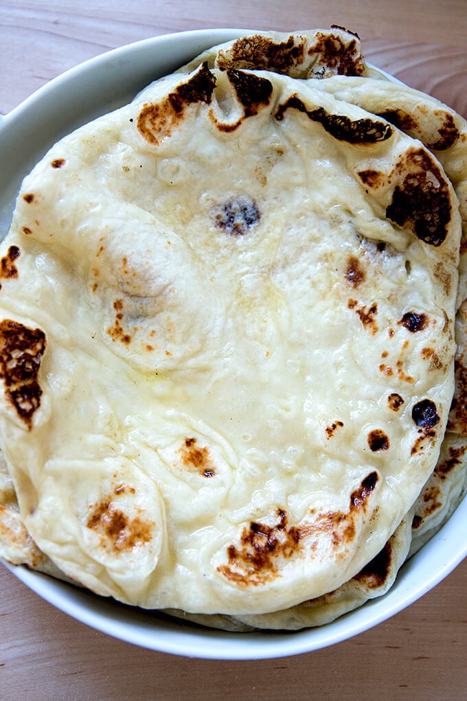 Homemade naan in a platter.