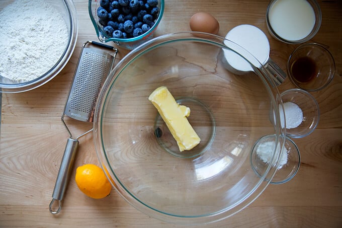 Ingredients to make lemon blueberry muffins on a countertop. 