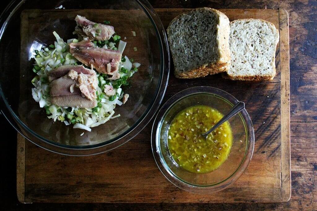 Components to make trout and avocado salad. 