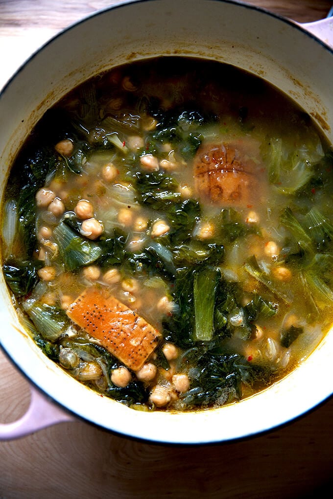 A large pot of escarole and chickpea soup.