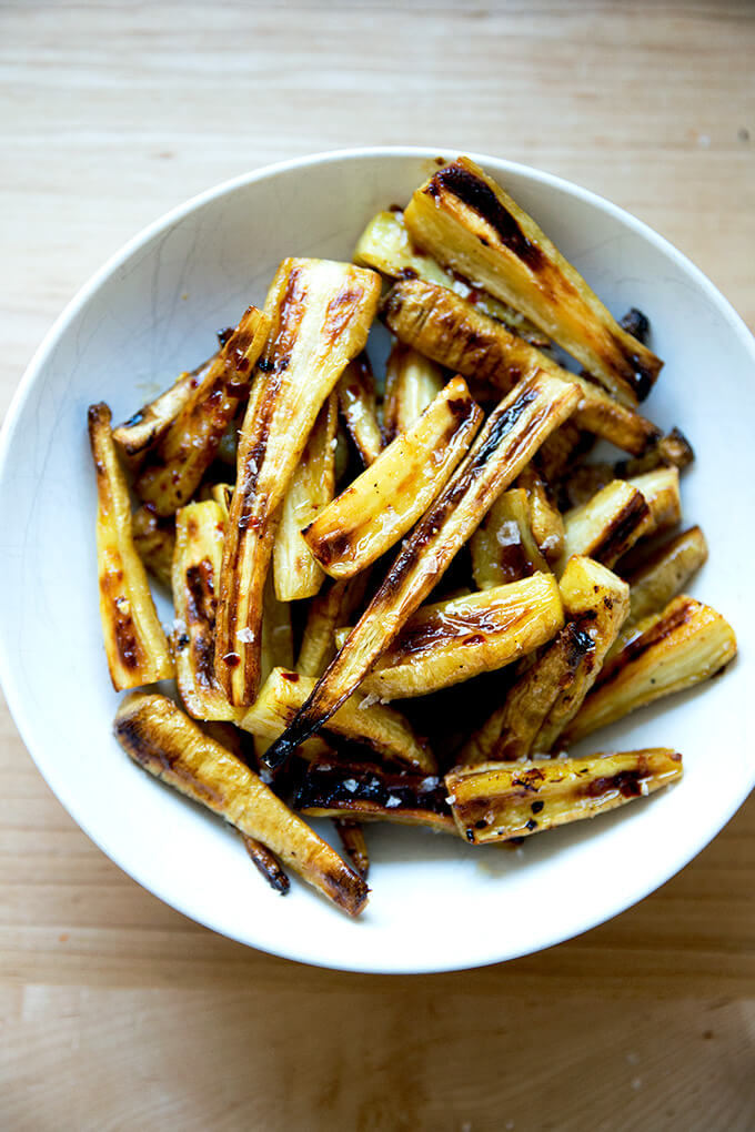 A bowl of roasted parsnips with chile-honey butter.