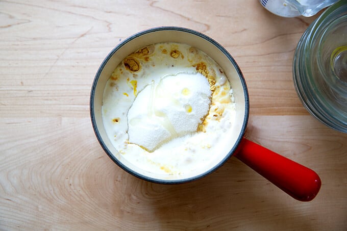 Ingredients for mustard sauce in a small saucepan.