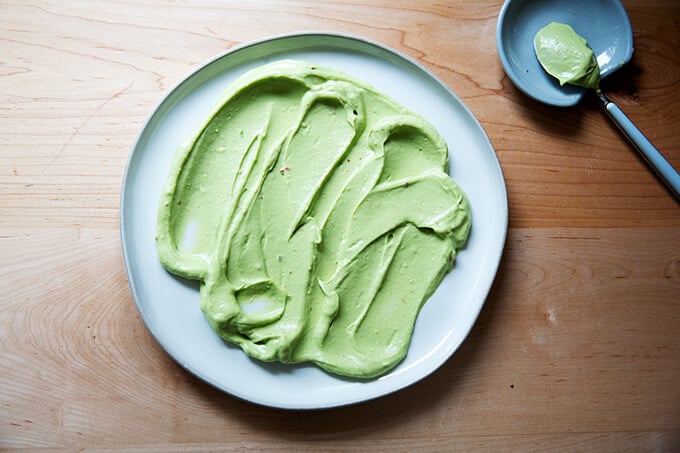 A platter spread with avocado cream.