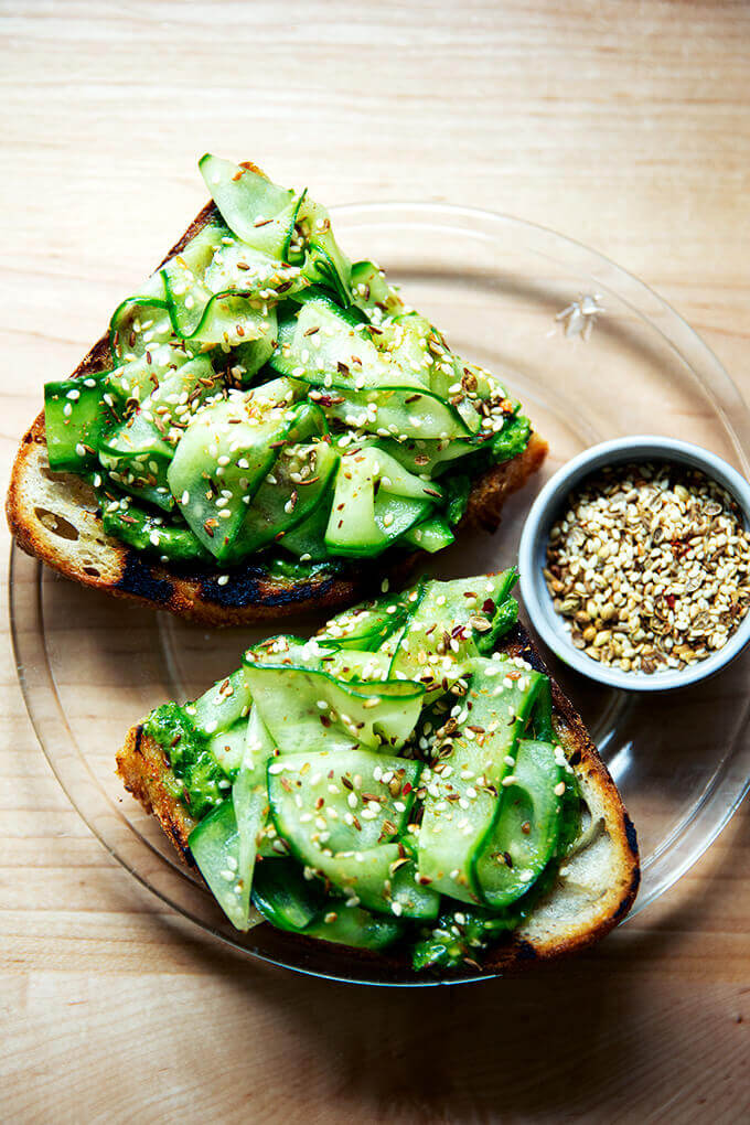 Cucumber toast with green sauce and dukkah.