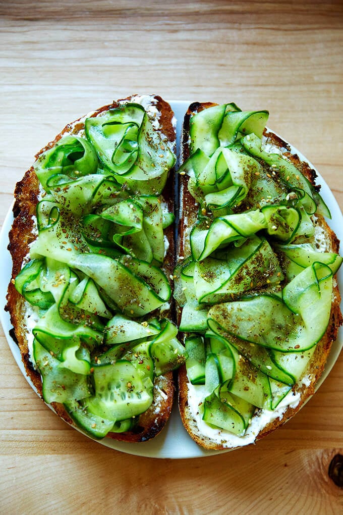 Cucumber toast with labneh and dukkah. 