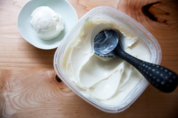 Scooping the frozen yogurt.