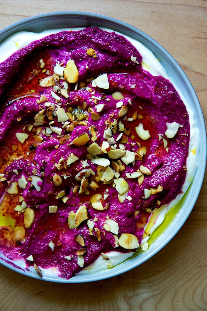 Raw beet dip garnished with toasted crushed almonds.