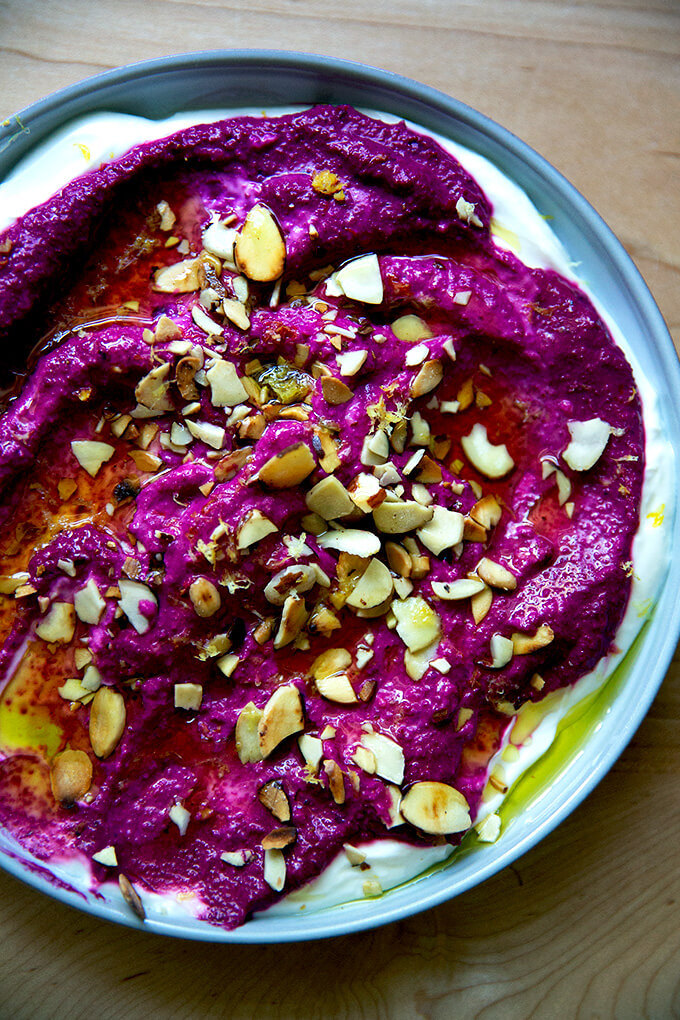 Raw beet dip garnished with toasted crushed almonds.