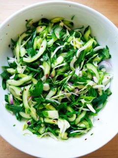 Cucumber and mint salad in bowl.