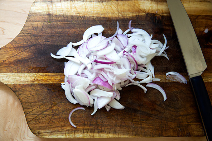 Sliced red onions.