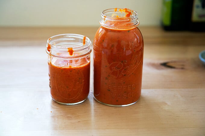 Two jars of tomato-basil sauce.