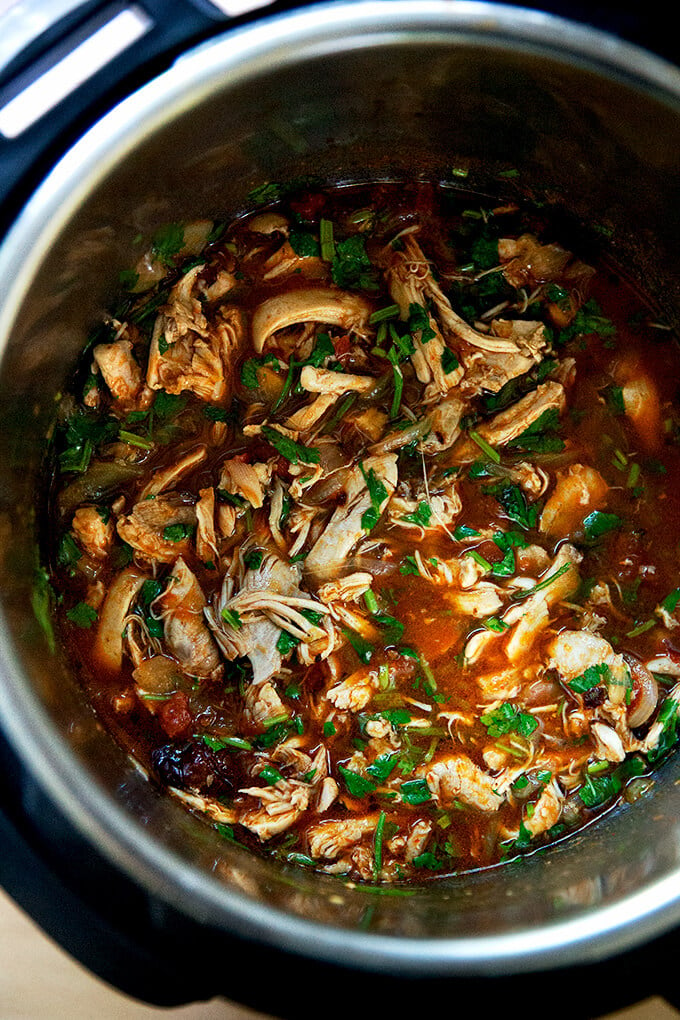 An Instant Pot filled with chicken tinga.