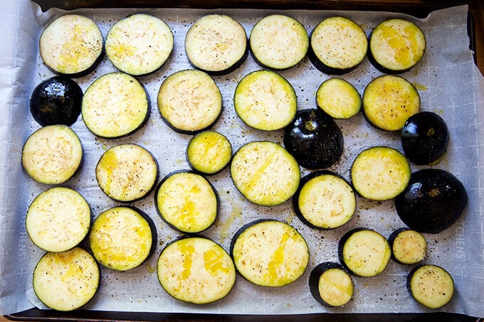 A sheet pan of eggplant slices.