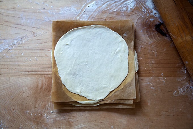 A stack of sourdough flour tortillas, uncooked.