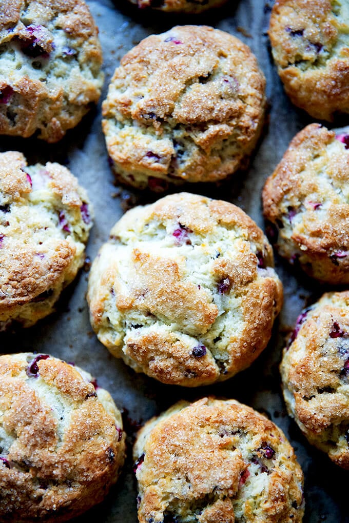 Just-baked cranberry scones on a sheet pan.