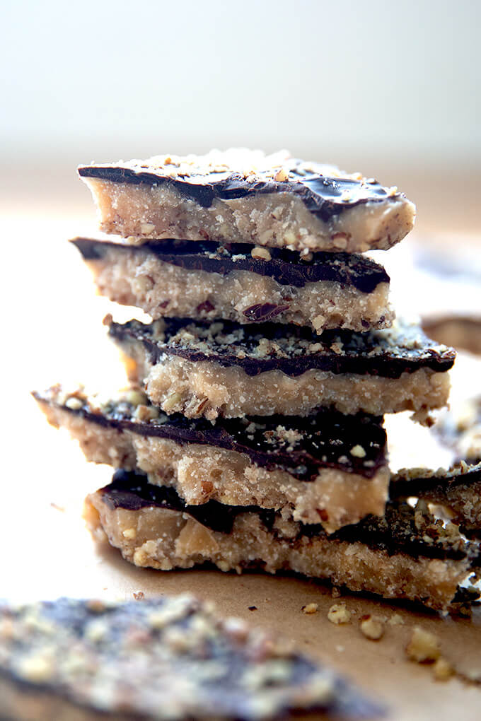 A stack of Milk and dark chocolate toffee shards. 