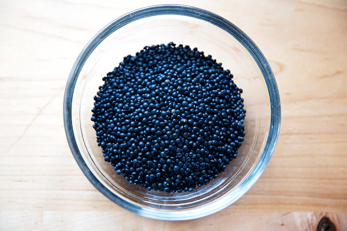 A bowl of black lentils.