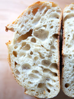 A halved loaf of sourdough bread.