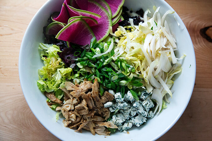 Ingredients for chopped salad in a bowl.