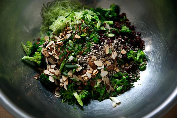 Ingredients for broccoli salad all tossed together.