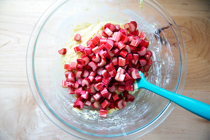 Adding the rhubarb to the batter for the buckle.