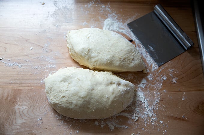 Brioche dough divided into two portions.