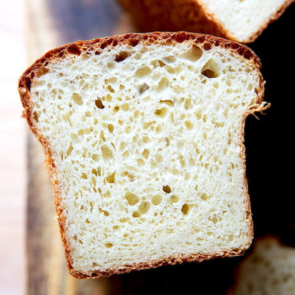 A halved loaf of brioche.