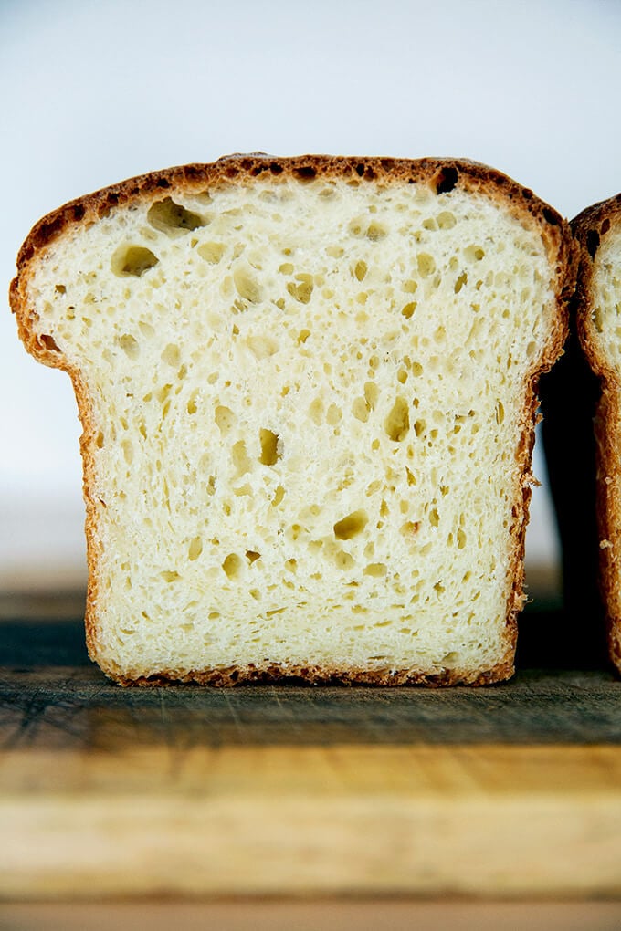 A halved loaf of brioche.