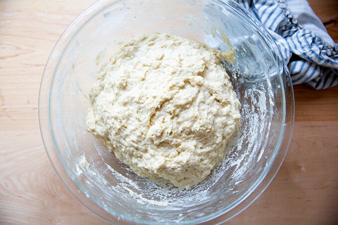 A bowl filled with mixed brioche dough.