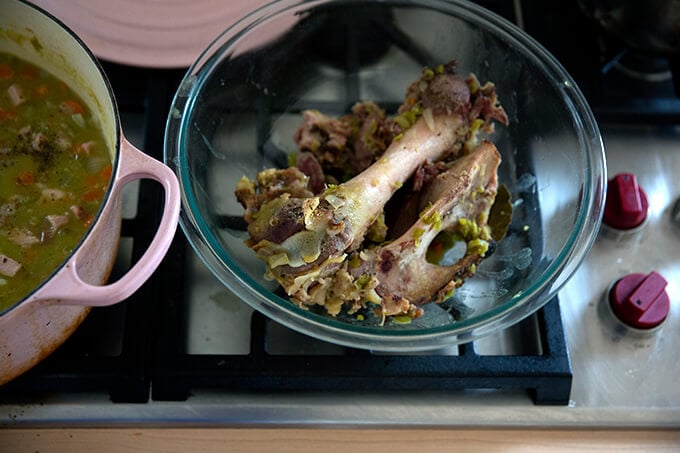 A ham bone in a bowl.