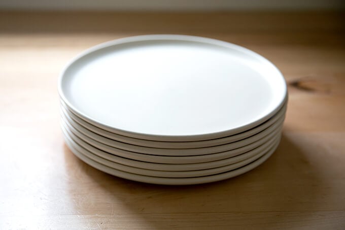 A stack of white plates.