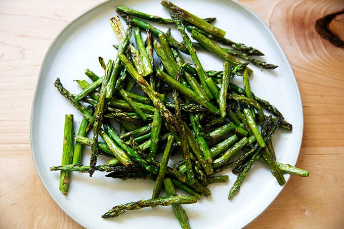 Roasted asparagus on a platter.