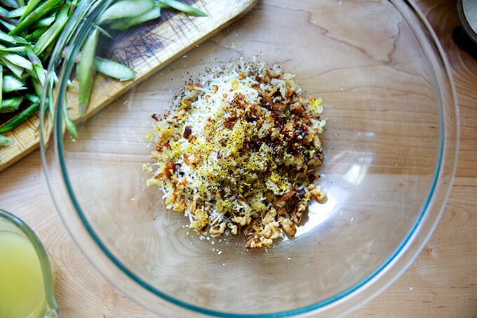 A mixture of walnuts, toasted bread crumbs, parmesan, and lemon.