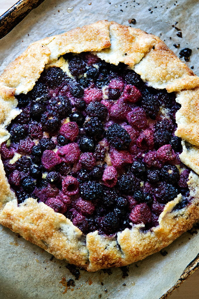 Mixed berry galette on a sheet pan.