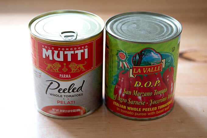 Two 28-ounce cans of whole, peeled tomatoes.