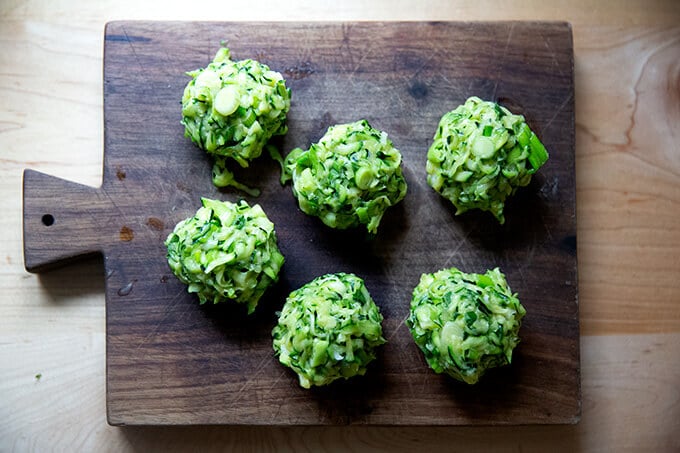 Portioned zucchini fritter balls. 