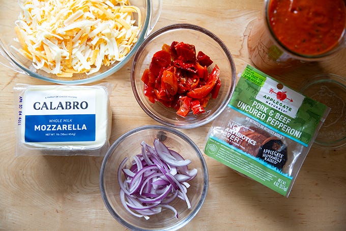 A selection of toppings for Detroit-style pizza. - 15