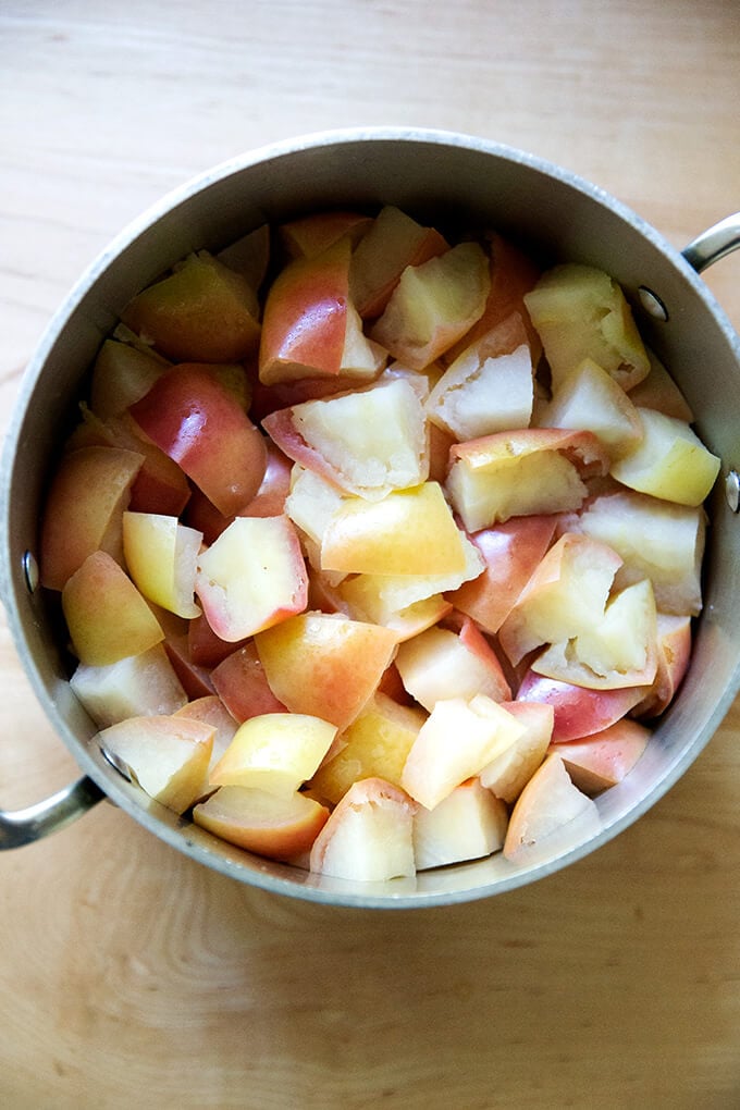 Cooked apples in a pot on a countertop. 