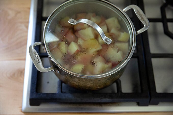 Cooked apples on the stovetop. 