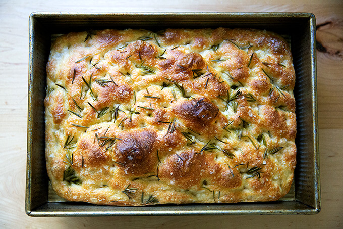 Just baked rosemary focaccia in a pan.